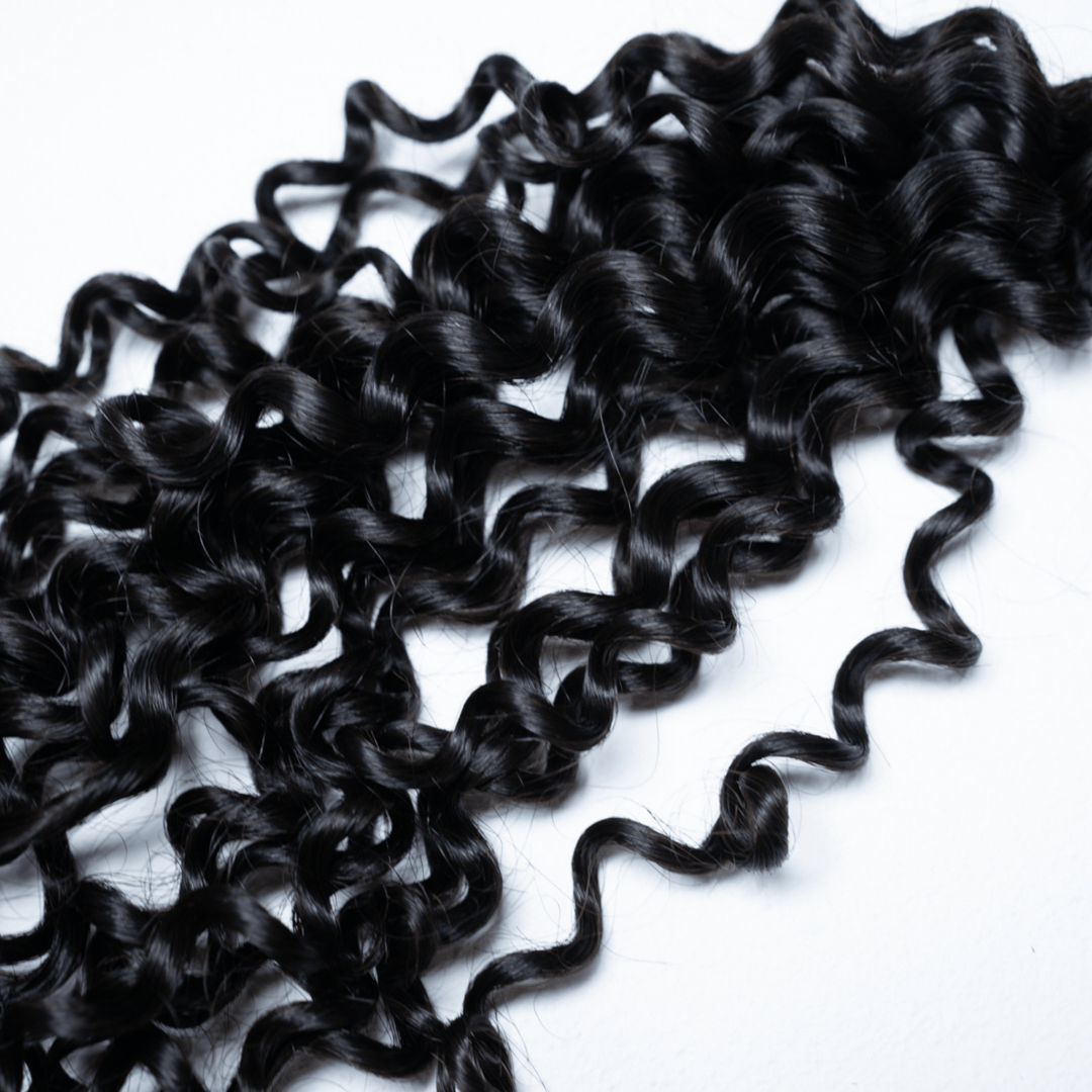 100% Virgin Human Hair Curly Bundles close-up