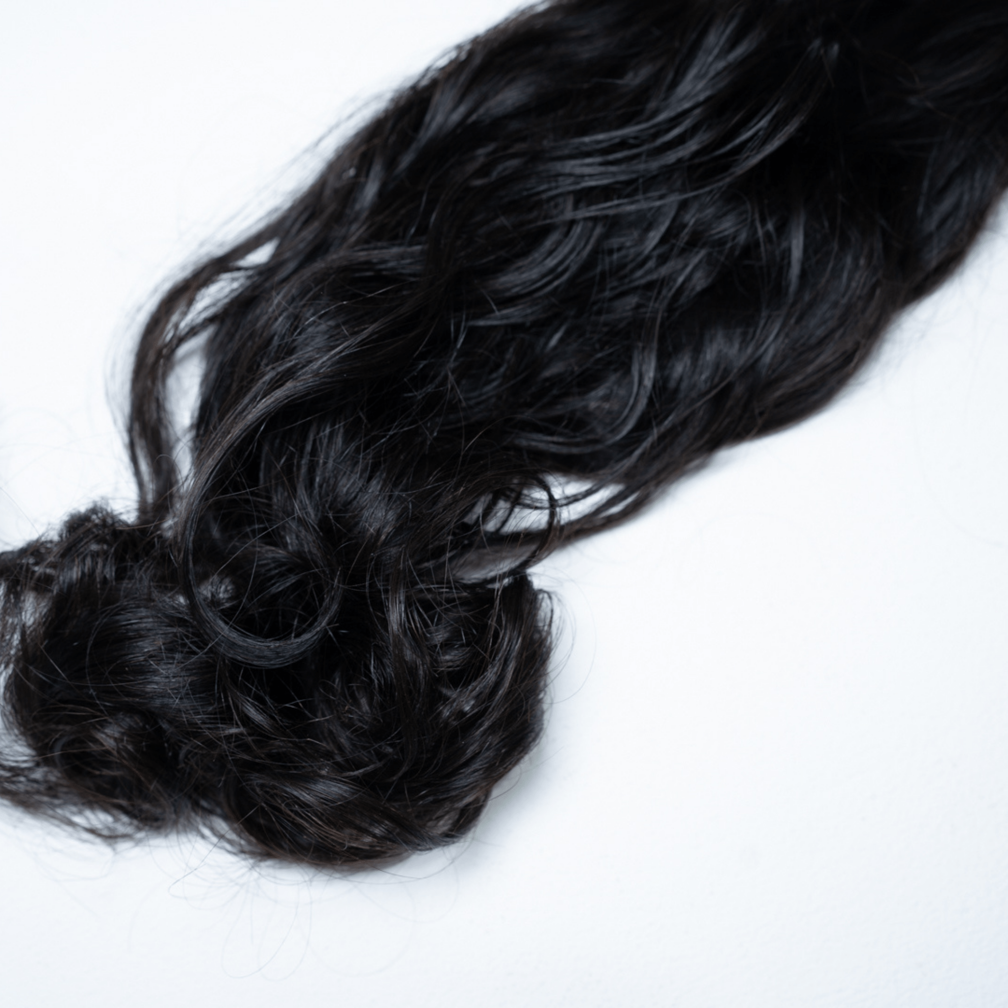 100% Virgin Human Hair Natural Wave Bundles styled in loose waves